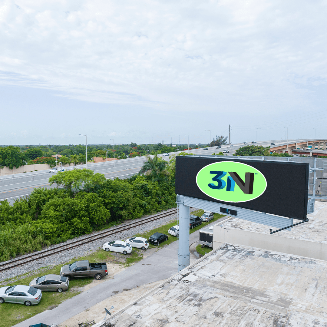 A large billboard on top of a building.