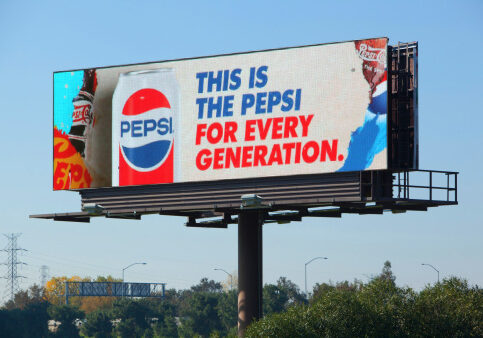 Blank billboard against blue sky, put your own text here